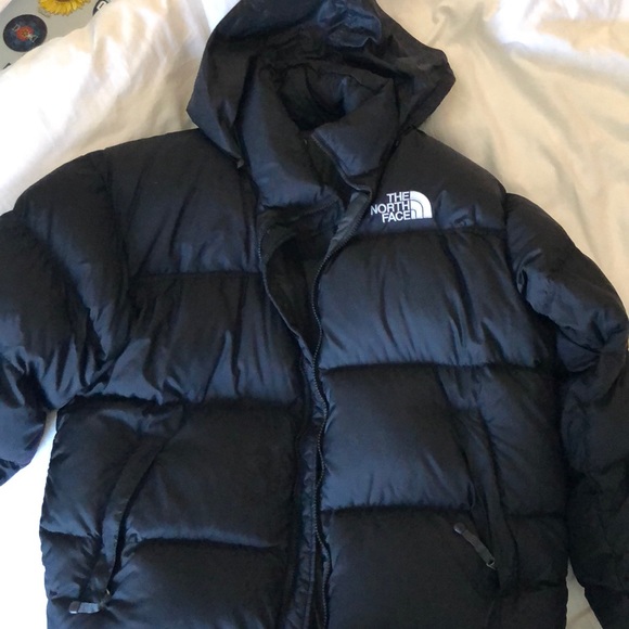 black puffy north face jacket